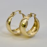 18 Karats Bold Loops. yellow gold, purity 750, item made in Dubai